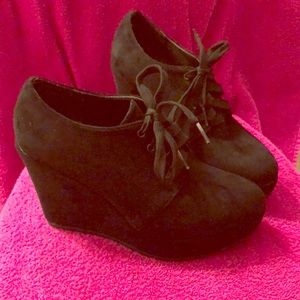 Black wedge booties.
